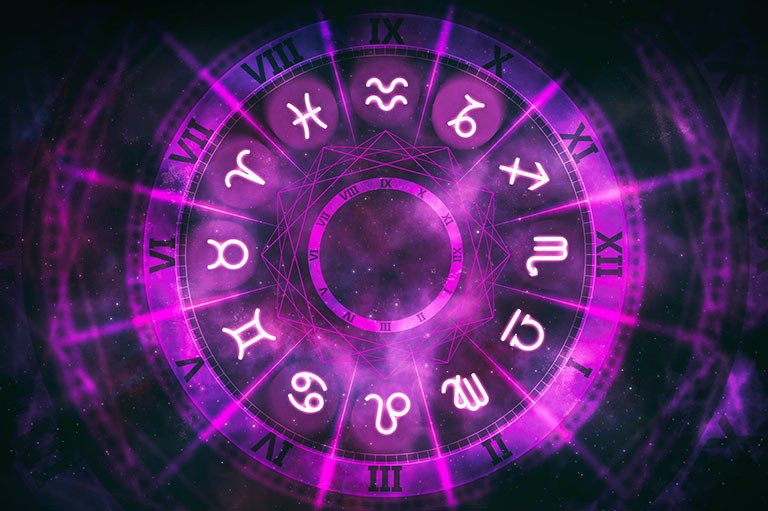 Symbole znaków zodiaku na tablecie